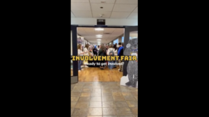 Door to the Involvement Fair - peeking in to all the student organizations featured.
